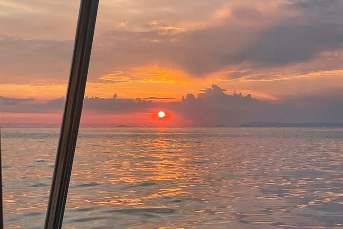 2-Hour Sorrento Coast Sunset Cruise with Dinner Experience - The Sorrento coast stretch: Puolo Bay and the big cliffside moments