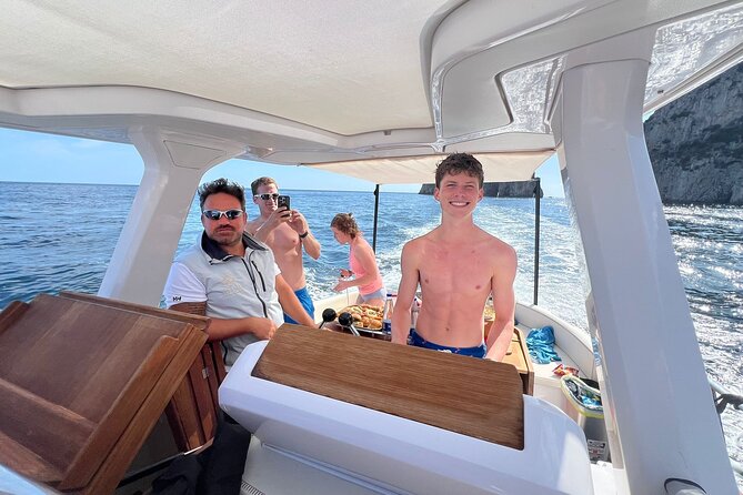 All inclusive Capri Boat and City Tour from Sorrento - Calm coves and classic Capri viewpoints: Faro, caves, and quiet sea air