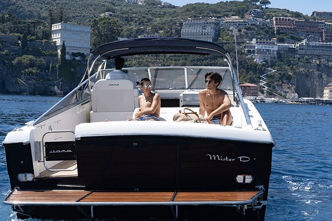 Amalfi Coast Private Boat Tour from Sorrento, Positano & Capri - Included onboard perks: drinks, snacks, snorkeling gear, and comfort