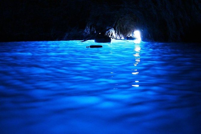 Capri & Blue Grotto Semi Private Boat Day Trip from Sorrento - Onboard perks: drinks, Caprese lunch, swimming stops, and snorkeling gear