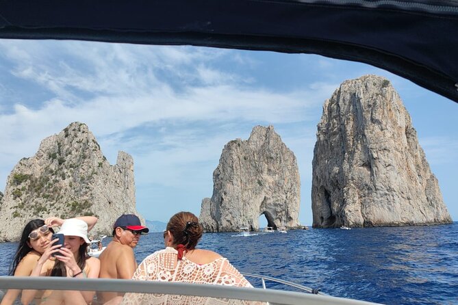 Capri Boat Tour and City Visit from Sorrento - The coastline route: Punta Carena, Marina Grande, and sunset potential