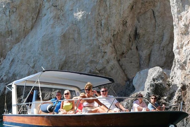 Capri Boat Tour from Sorrento: Swim, Grottos & Light Lunch - The Capri sea-cave route: White Grotta and Grotta Verde in plain terms