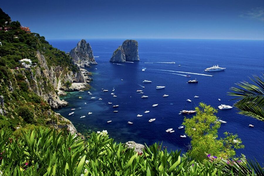 Capri: Day & Night Boat Tour - Cruising Capri’s Coast: Faraglioni Views and Grotto Stops