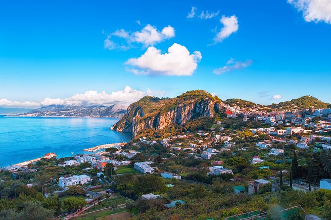 Capri Guided Boat Experience with Island Exploration and Transfer - Faraglioni and the Natural Arch: Big Photo Energy, Explained