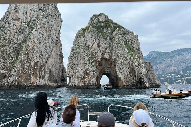 Capri in a Day All Inclusive Premium Boat Tour + City Visit - Cala del Rio and the Heart Cave: Cliffs, Style, and a Small Wonder
