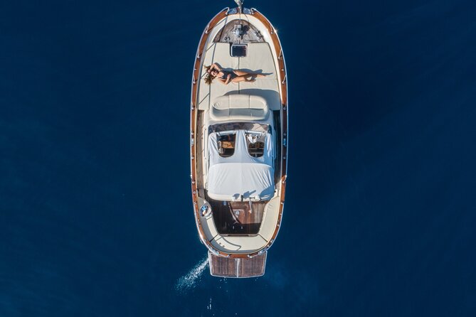 Capri-Positano Private Yacht tour from Sorrento,Positano or Capri - Villa Malaparte and the Faraglioni backdrop