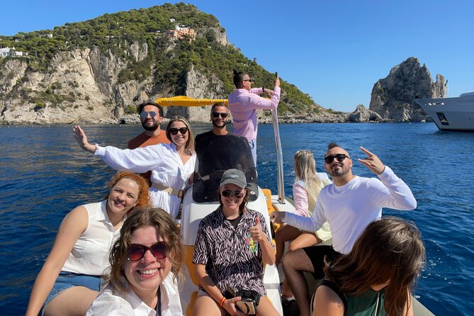 Capri Tour & Blue Grotto (Half-Day) from Sorrento - Natural Arch and Faraglioni: Capri icons seen from sea level