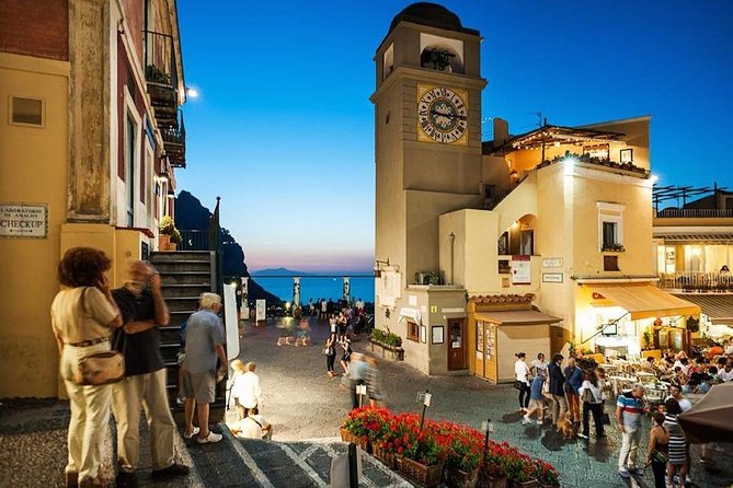 Day to Night Capri Boat Tour with Swim, Snorkel & Aperitif - Bagni Regina Giovanna: Roman ruins and a waterfall view