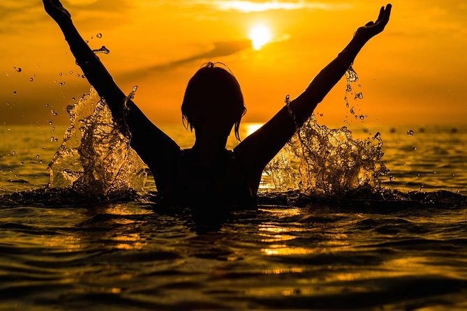 Day to Night Capri Boat Tour with Swim, Snorkel & Aperitif - Capri swim and snorkel stop: the water break is short but real