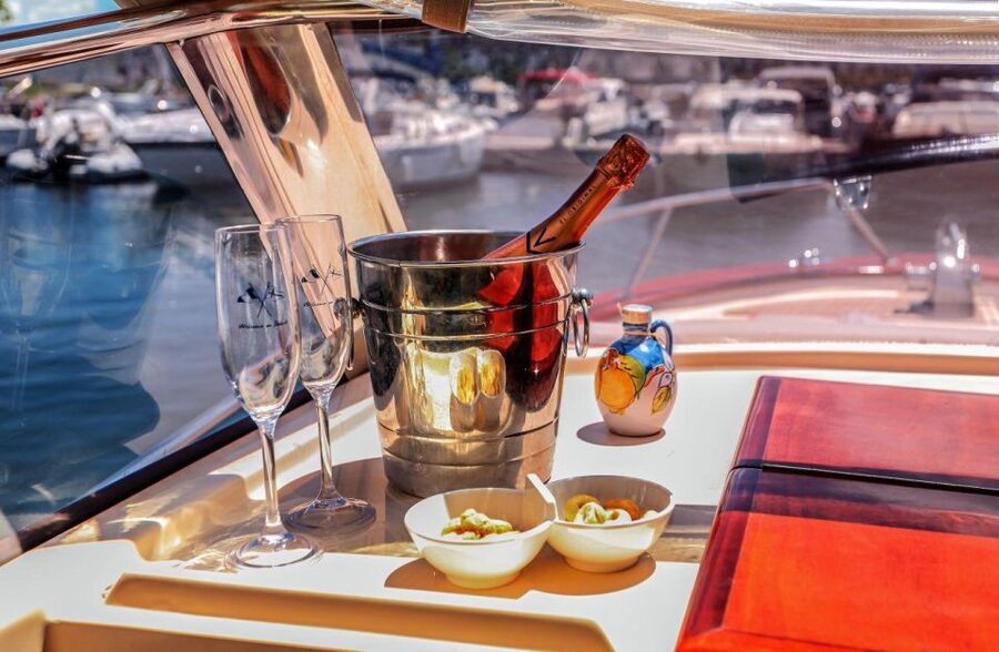 Discover Capri's Hidden Gems: Group Tour Boat Experience - Boat vibe, crew energy, and the small-group feel