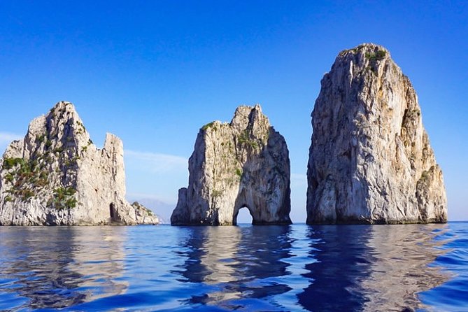 Exclusive Private VIP Capri Boat Experience on a Gozzo - Docking at the Marina and choosing Capri vs Anacapri