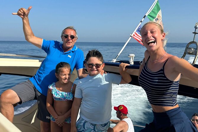 From Sorrento: Capri & Blue Grotto Boat Day Tour Up to 8 People - Lighthouse views and the Green Grotto stop
