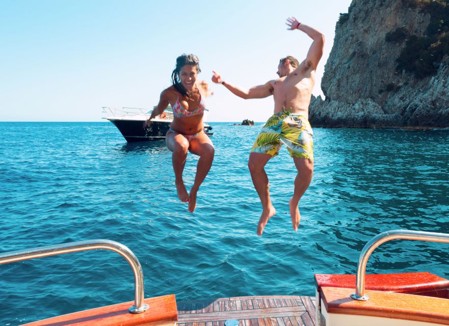 From Sorrento: Capri Island Small Group Boat Excursion - The real show: Capri coastline cruise with grotto and rock views