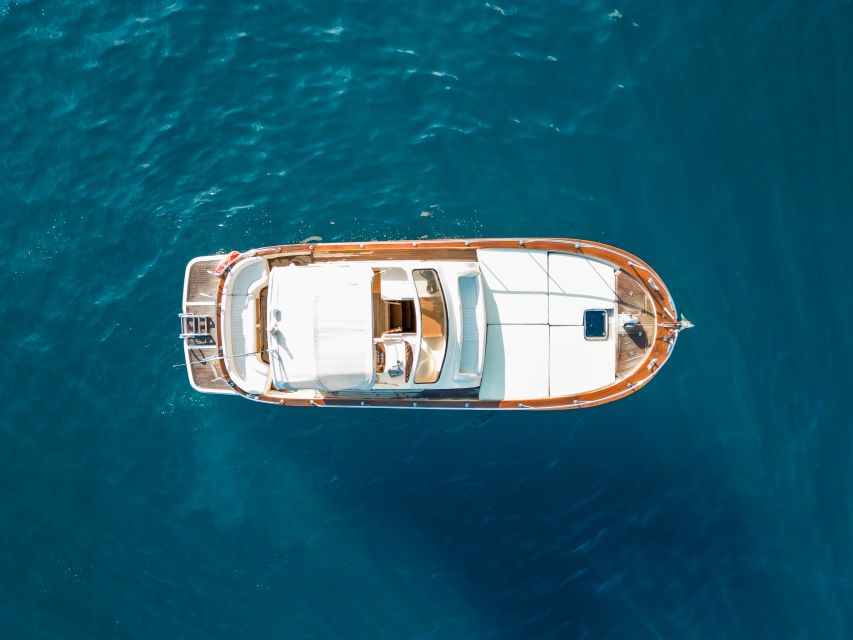 From Sorrento: Ischia and Procida Boat Tour with Snorkeling - Sant’Angelo and Ischia Highlights: Mortella Garden and Aragonese Castle