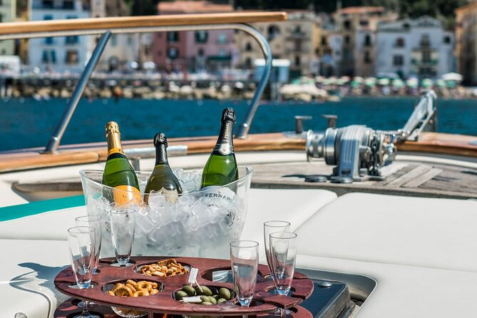 Full-Day Amalfi Coast Private Boat Tour from Sorrento or Positano - Positano for shopping, beach views, and a real break