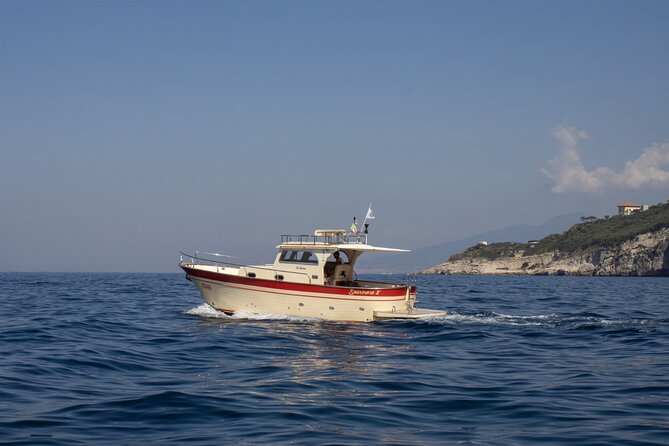 Group Capri tour , visit of caves, fishing legend and swimming - Capri by boat from Sorrento: what the day feels like