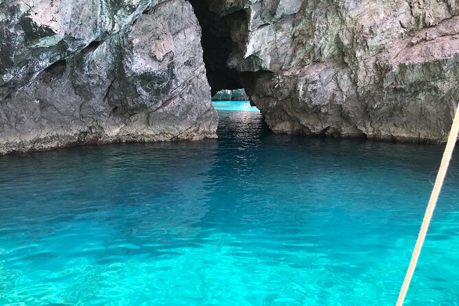 Guided day by boat to the Secrets of the Island of Capri - Elephant-shaped arch and the Faraglioni rock cluster