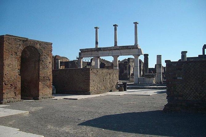 Guided Tour of Pompeii and Herculaneum with Lunch and Ticket - Stabian Baths, Lupanar, and Teatro Grande: the human side of Pompeii