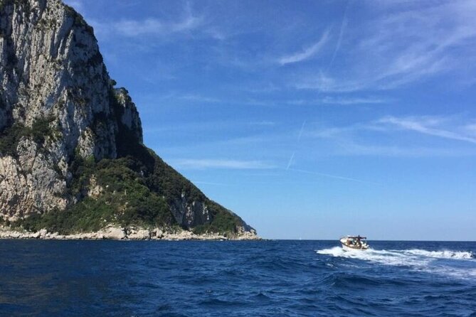 Luxury Capri Dining Experience & Aperitif with Yacht Transfer - Capri dinner with an open-top taxi and Faraglioni views