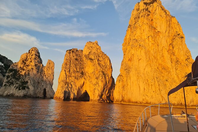 Private 4-Hour Boat Tour to Capri island with limoncello tasting - Faraglioni and lighthouse views: seeing the rocks and forts from the right angle