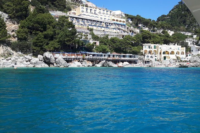Private boat excursion to Capri from Sorrento - 7 hours - The cave circuit: paid grotto time, the Green Grotto, and the Madonna-shaped view