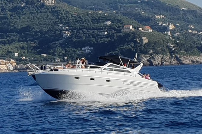 Private boat excursion to Capri from Sorrento - 7 hours - Lighthouses, Faraglioni, and the big natural arch: the iconic rock tour from the water