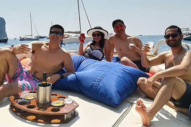 Private Boat Tour from Sorrento to Positano and Amalfi - Punta Campanella: cliffs, clear water, and Siren-level drama