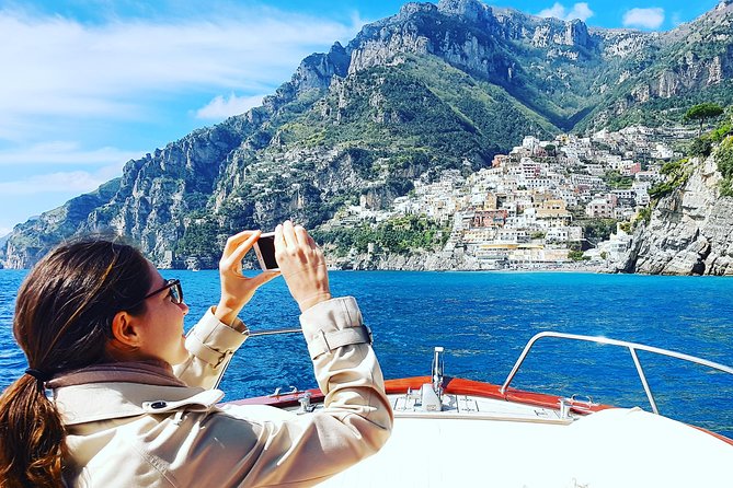 Private Boat Tour Sorrento to Positano & Amalfi–Typical Gozzo 850 - Positano from two angles: onboard views, then time on foot