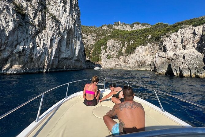 Private Boat Tour to Capri's Hidden Gems with Local Skipper - Marina Grande and Bagni di Tiberio: a soft landing before the caves