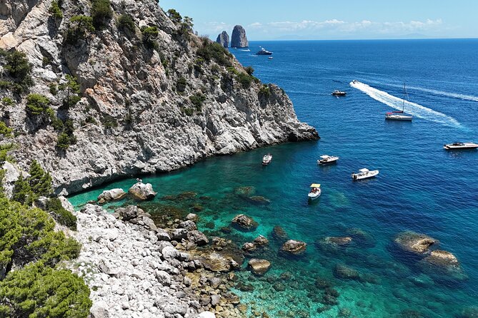 Private Boat Tour to discover Capri - Green Grotta and Punta Carena: light, color, and that lighthouse landmark