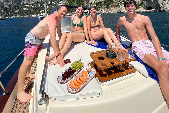 Private Capri Boat tour BEST SELLER - Faraglioni, Natural Arch, and Marina Piccola yacht views