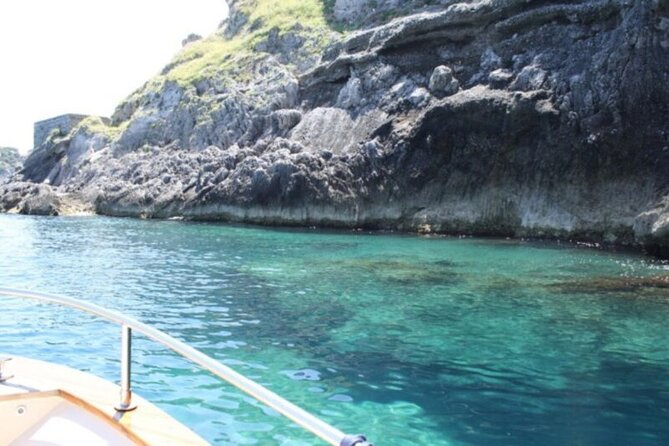 Private Capri Luxury Boat Experience: Cruise, Swim & Sunbathe - Onboard essentials: towels, drinks, snacks, and the lunch reality