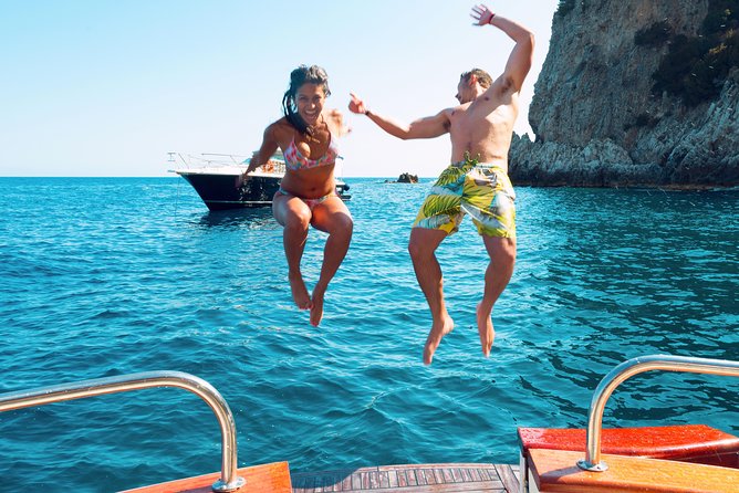 Semi-Private Capri Boat Tour with Snorkeling & Island Visit - Punta Carena Lighthouse: active since 1867, seen from the sea