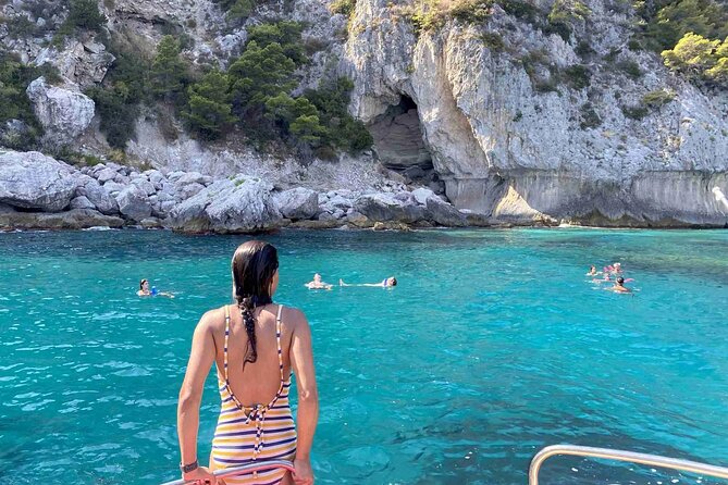 Shared 4 Hours Afternoon Capri Boat Tour: Blue Grotto & Swim - Tiberius’ Leap and Punta Carena Lighthouse: Short Stops, Big Payoff