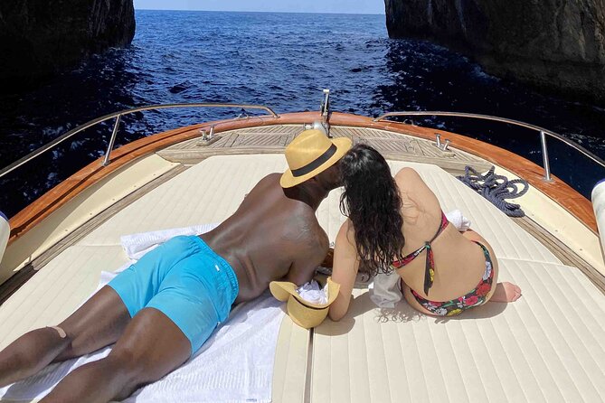 Shared 4 Hours Afternoon Capri Boat Tour: Blue Grotto & Swim - Onboard Extras: Small-Group Feel, Fresh Fruit, and Limoncello