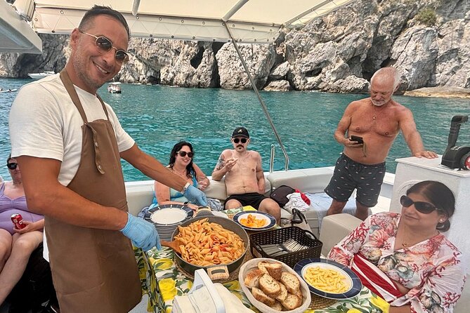 Shared Tour Positano and Amalfi From Sorrento with Lunch - Lunch onboard: Pennette alla sorrentina and catch of the day