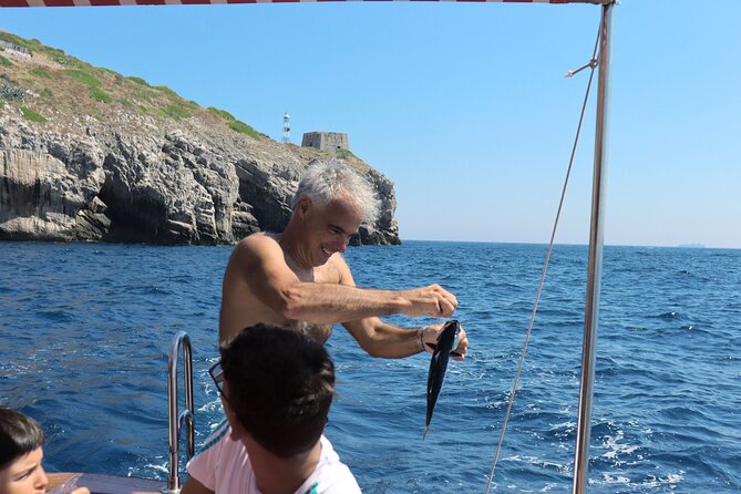 Shared trip with fishing and visit the beauty of Capri island - Capri from the water: Marina Grande, Blue Grotto, and Punta Carena