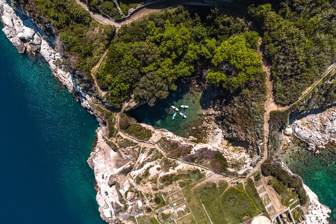 Small group paddle boarding tour to Bagni Regina Giovanna - Swim time, photos, and real-world crowd dynamics