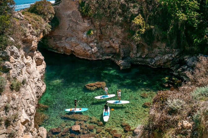 Small group paddle boarding tour to Bagni Regina Giovanna - SUP as a workout: effort level, board balance, and the wetsuit gap
