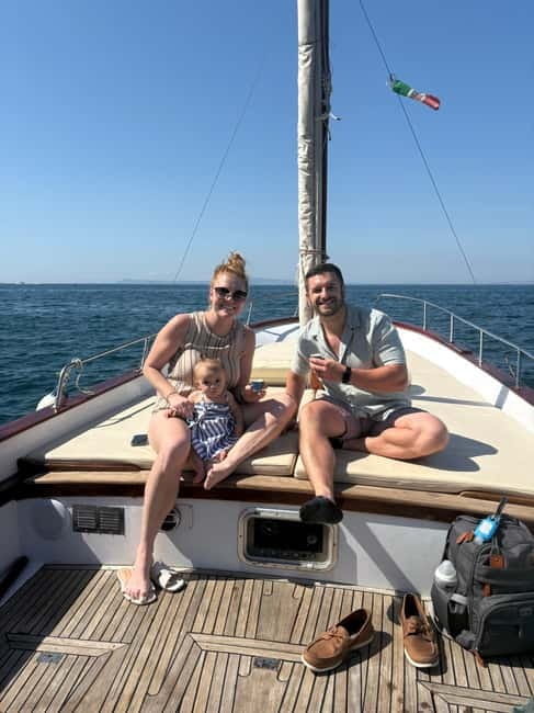 Sorrento: Boat Coastal Cruise with Swim and Limoncello - Marina Grande departure: the dock scene is part of the experience