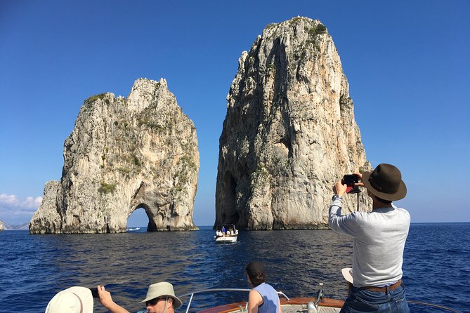Sorrento: Capri Select Boat Trip with Swim, Drinks & Pick Up - Green Cave, Anacapri Lighthouse Visuals, and the Capri Icons From the Sea
