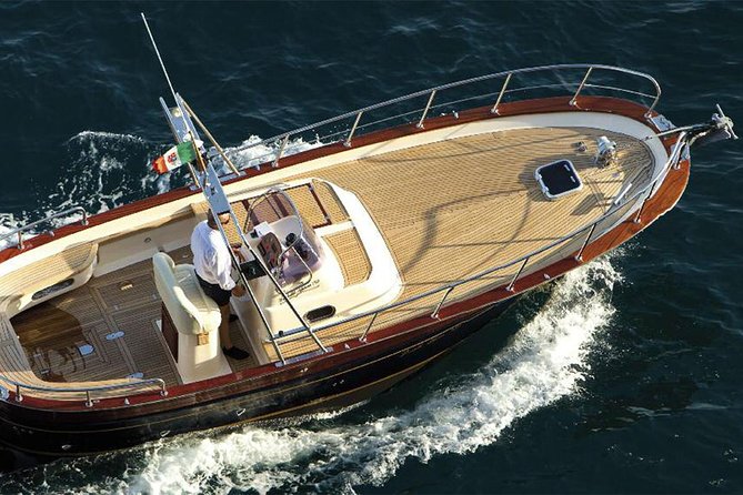 Sorrento: Exclusive Capri Private Boat Tour & Blue Grotto - The coastline portion: wood-boat views and the “Capri from every angle” effect