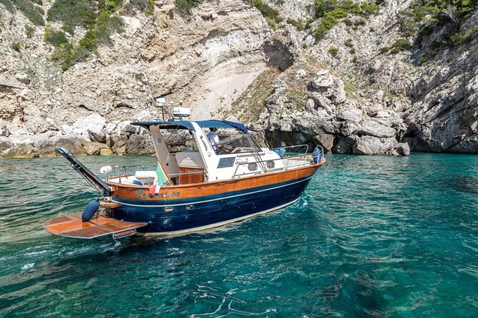 Sorrento to Capri Private Boat Experience on a Gozzo Apreamare 10 - Faraglioni and Punta Carena: icons, plus a quieter scenic pass