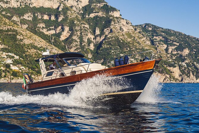 Sorrento to Capri Private Boat Experience on a Gozzo Apreamare 10 - Capri’s signature coast: White Grotta, Natural Arch, Green Grotto