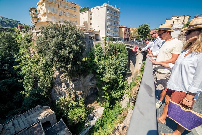 Sorrento Walking Tour with a Local Guide - Chiostro di San Francesco: Columns, a Pepper Tree, and Mixed Eras