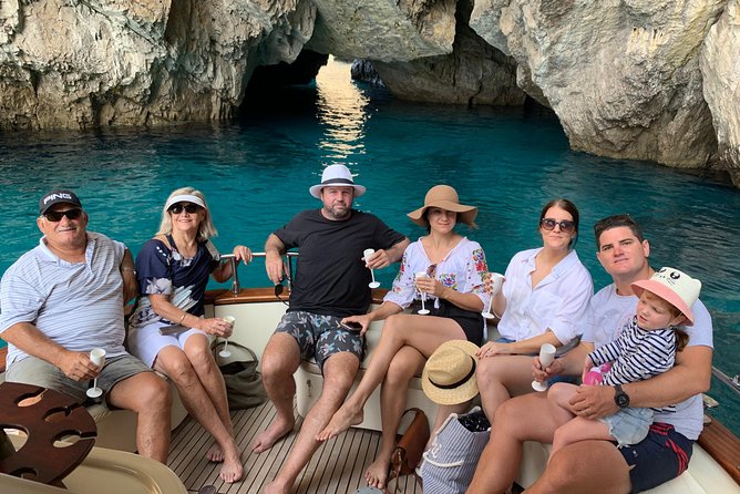 Sunset boat experience in Sorrento coast - Stop for the Natural Waterfall Shower Near Massa Lubrense