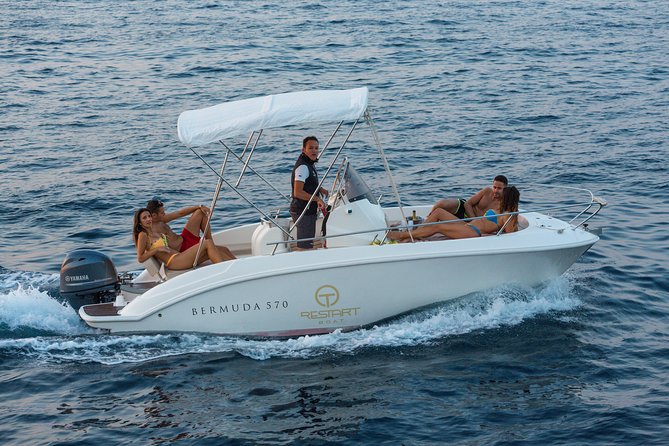 The Blue Dream: Capri Boat Tour from Sorrento - Your boat day experience: drinks, Bluetooth, snacks, and comfort